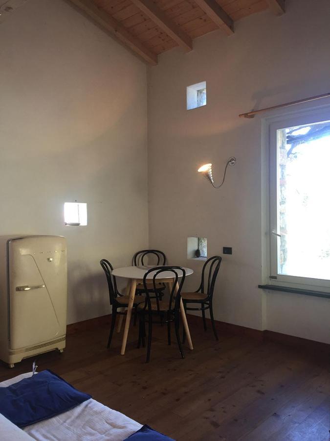 Cottage La Torre Del Pittore โบนัสโซลา ภายนอก รูปภาพ