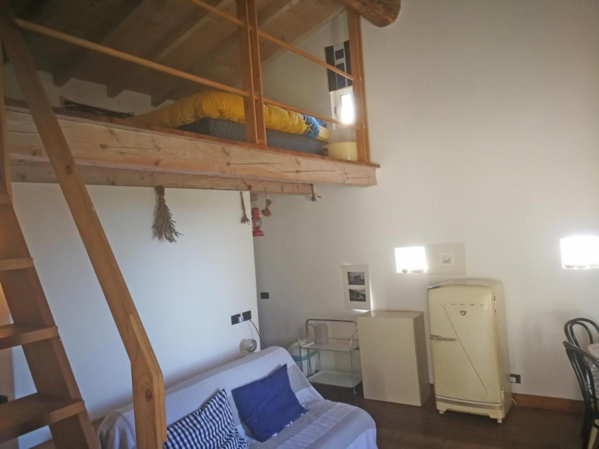 Cottage La Torre Del Pittore โบนัสโซลา ภายนอก รูปภาพ