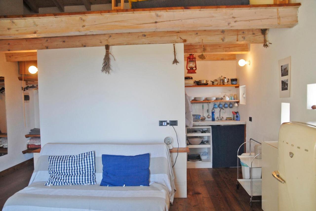 Cottage La Torre Del Pittore โบนัสโซลา ภายนอก รูปภาพ