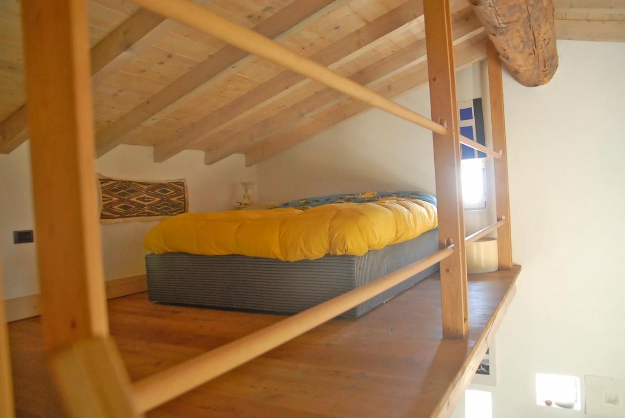 Cottage La Torre Del Pittore โบนัสโซลา ภายนอก รูปภาพ