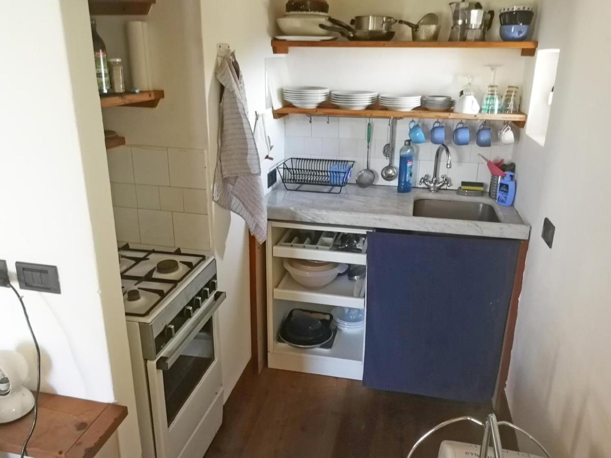 Cottage La Torre Del Pittore โบนัสโซลา ภายนอก รูปภาพ